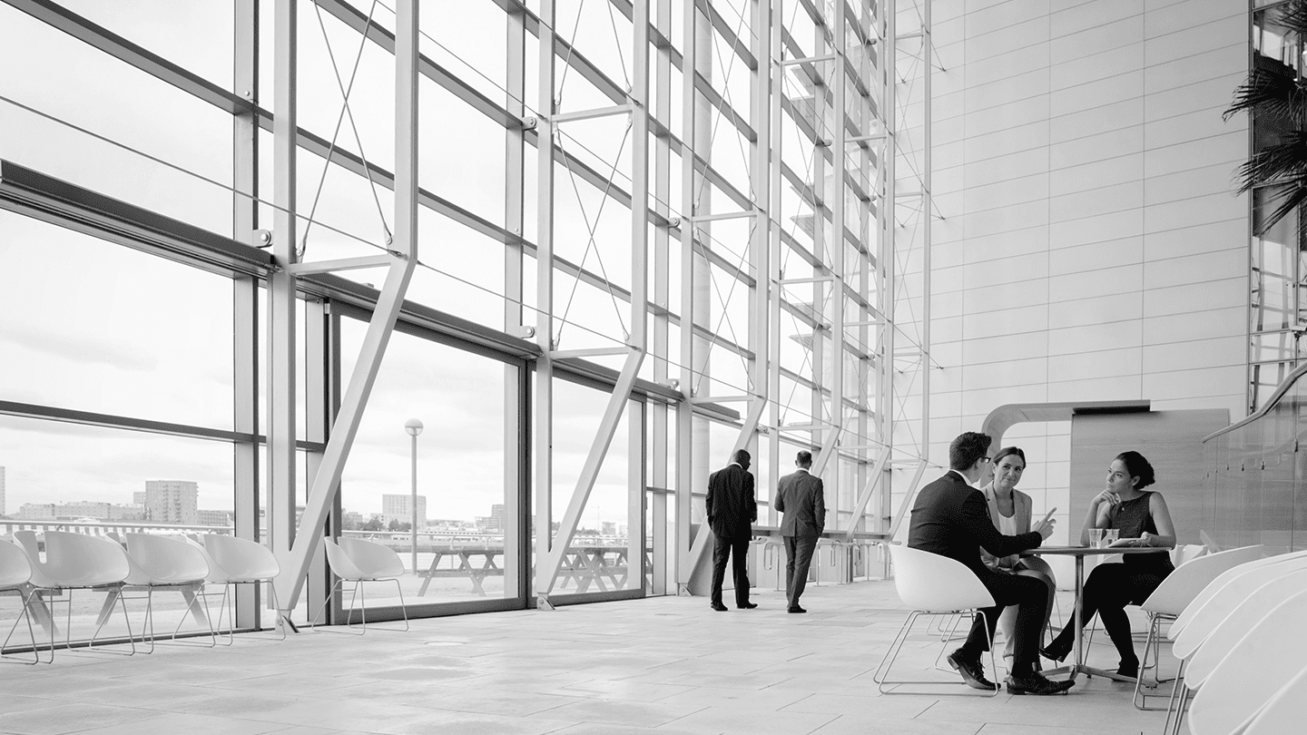 People walking in building lobby